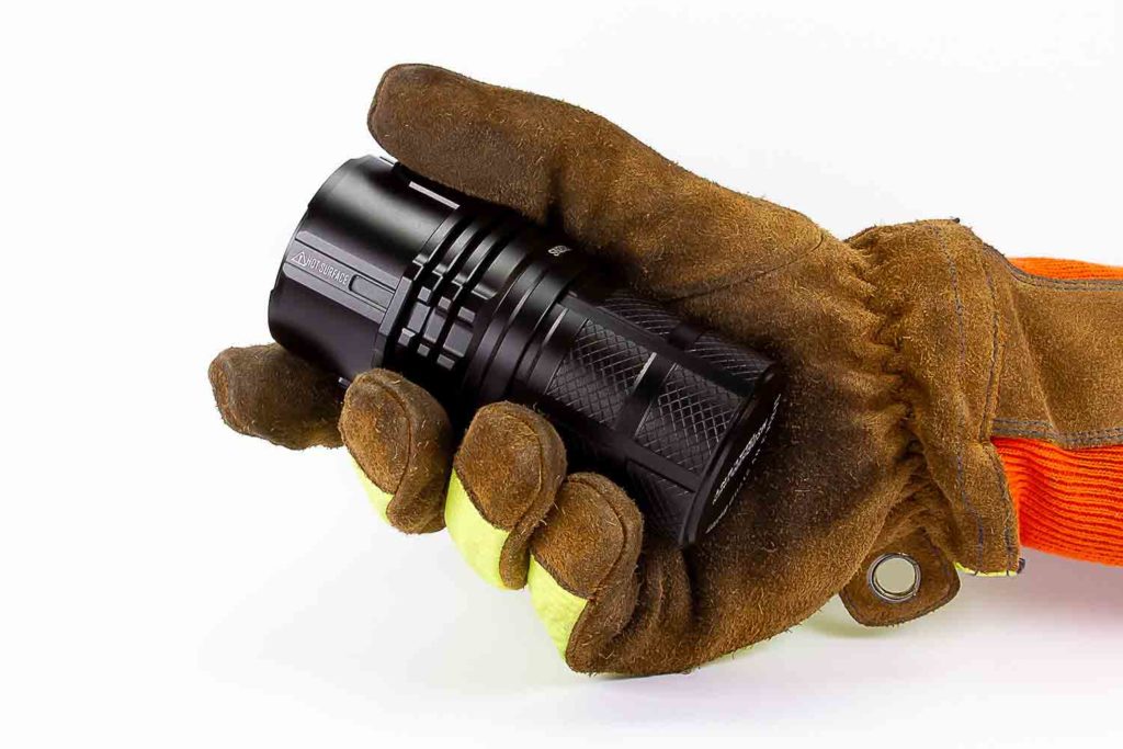 flashlight holding with firefighters glove