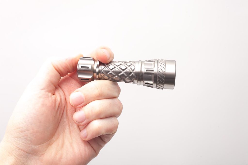 titanium jetbeam flashlight holding in cigar grip