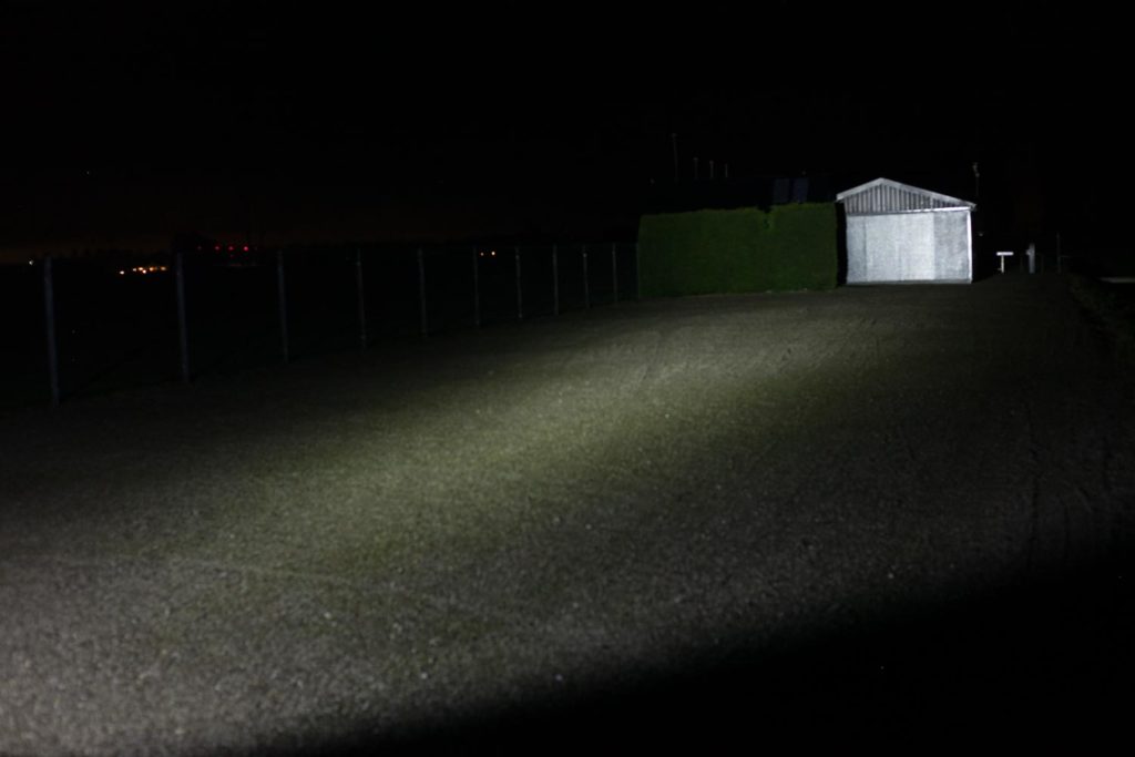 beamshot at night with shed